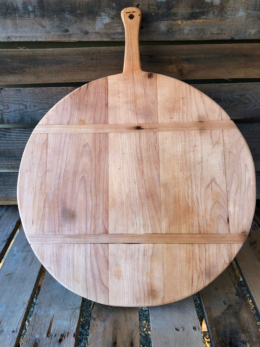 http://shop.thecelticfarm.com/cdn/shop/products/best-charcuterie-board-vintage-style-round-maple-french-breadboard-841865_1200x1200.jpg?v=1682337078
