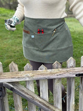 Load image into Gallery viewer, Hunter Green Waxed Canvas Half Apron with Real Leather Strap - The Celtic Farm
