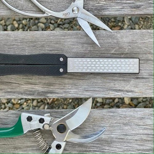 https://shop.thecelticfarm.com/cdn/shop/products/garden-tool-sharpener-diamond-carbon-steel-hone-reversible-paddle-for-sharpening-pruners-clippers-mower-blades-and-scissors-477843_300x300.jpg?v=1696823446